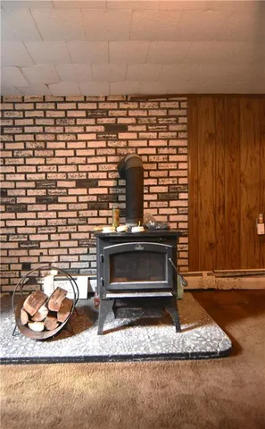a stove top oven sitting inside of a kitchen