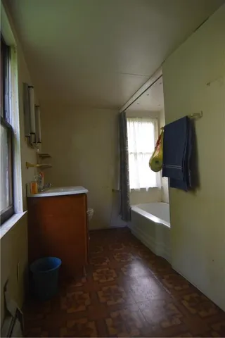 a view of entryway with wooden floor
