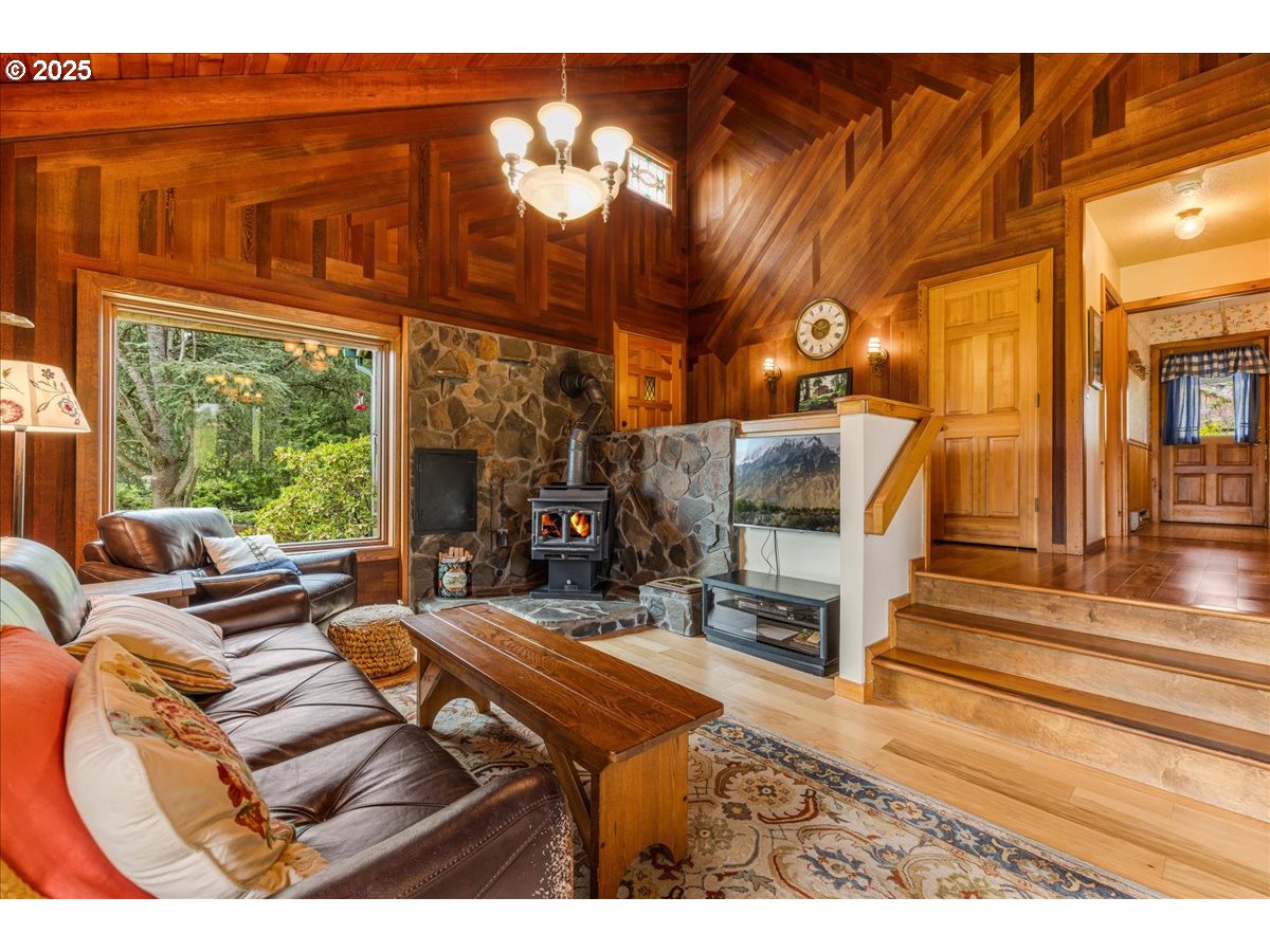 18258 South Dillman Road Oregon City, OR 97045 - Photo 11 of 43 a bedroom with furniture and a fireplace