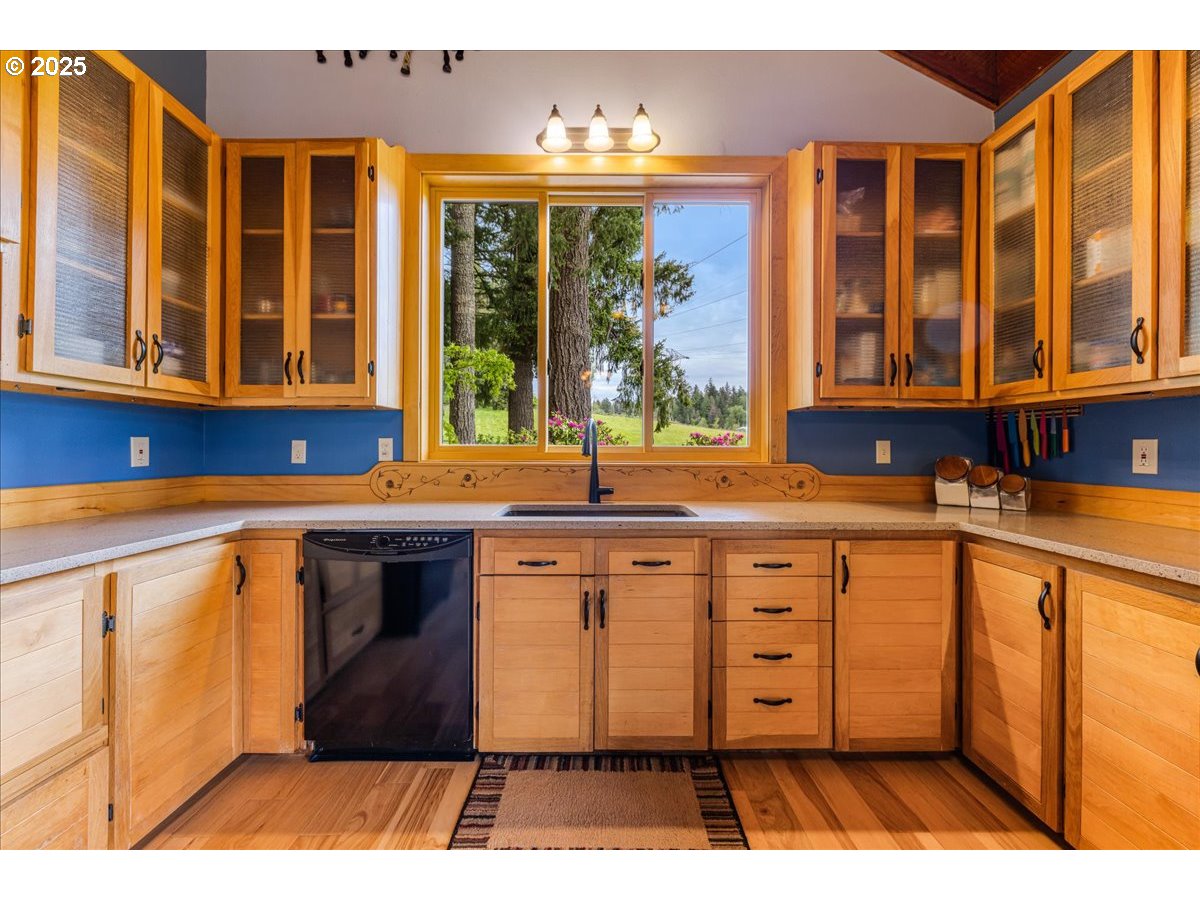 18258 South Dillman Road Oregon City, OR 97045 - Photo 16 of 43 a kitchen with a sink and cabinets
