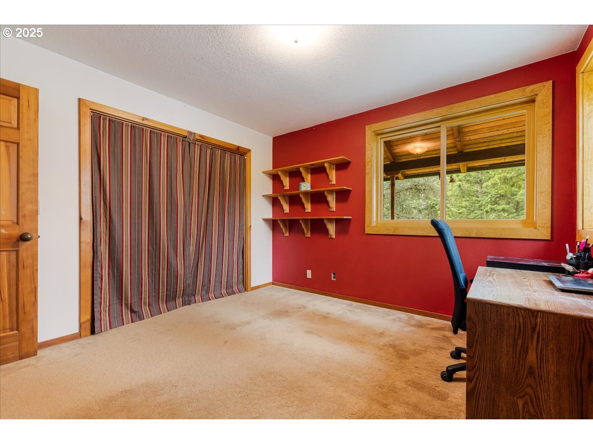 18258 South Dillman Road Oregon City, OR 97045 - Photo 20 of 43 a bedroom with a bed and a window