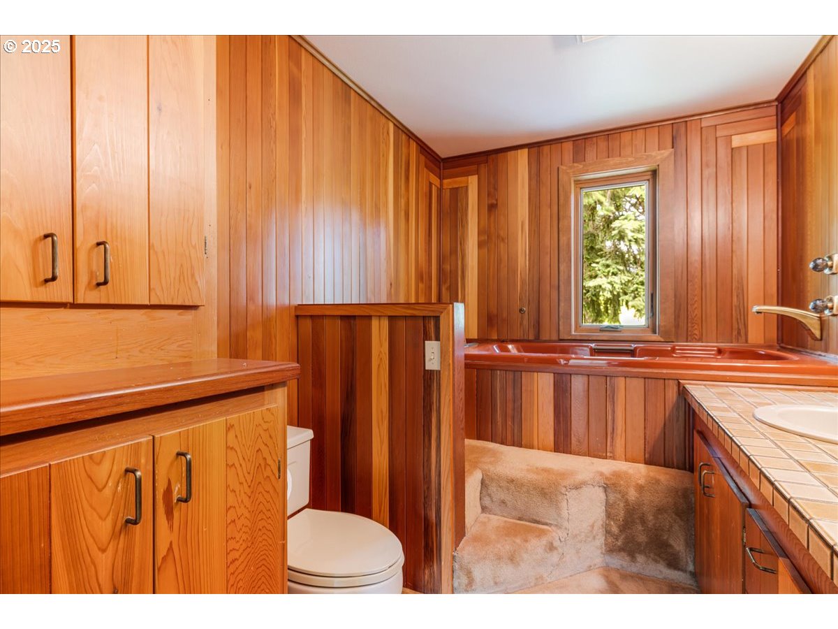 18258 South Dillman Road Oregon City, OR 97045 - Photo 26 of 43 a view of a kitchen with wooden floor and a window