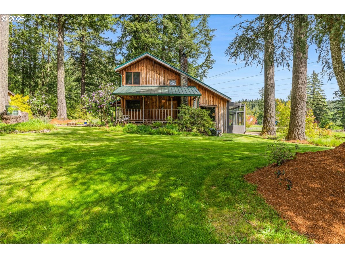 18258 South Dillman Road Oregon City, OR 97045 - Photo 34 of 43 a front view of a house with a yard