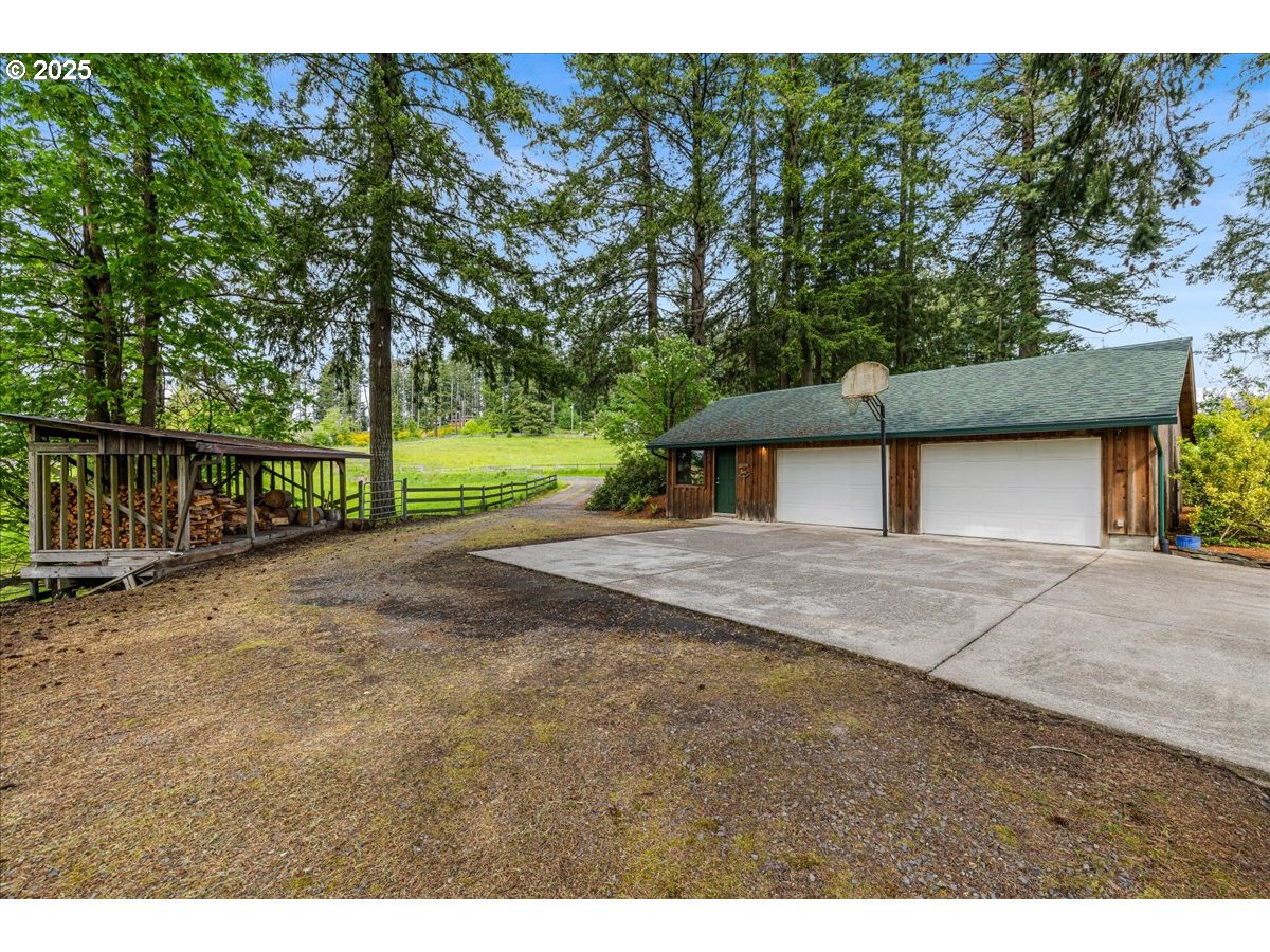 18258 South Dillman Road Oregon City, OR 97045 - Photo 5 of 43 a view of backyard of house with green space
