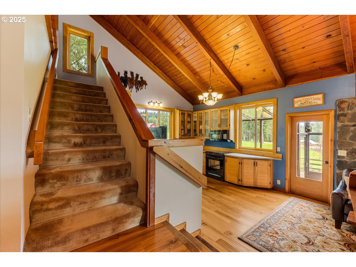 18258 South Dillman Road Oregon City, OR 97045 - Photo 9 of 43 a view of entryway and hall with wooden floor