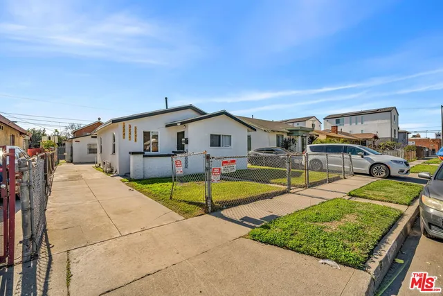 a view of residential house with outdoor space