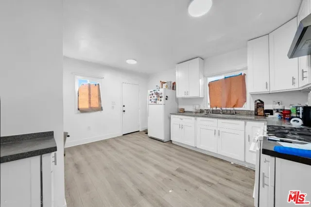 a bedroom with furniture and shower