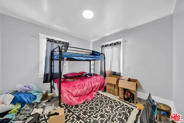 a bathroom with a sink a mirror and a bathtub