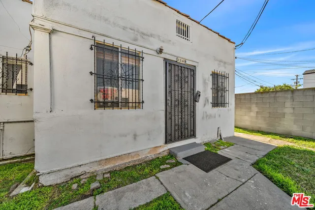 a view of a room with white walls