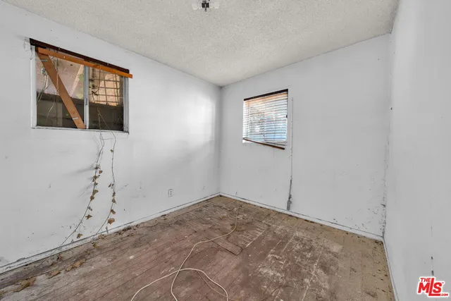 a picture of a bench in front of a door