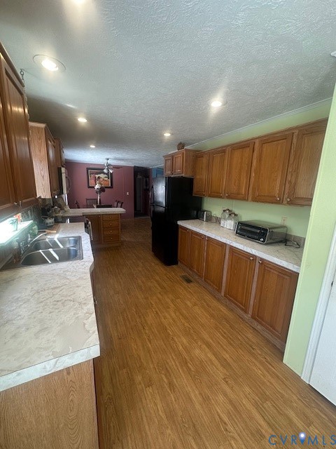 16738 Loco School Road Yale, VA 23897 - Photo 12 of 33 a kitchen with stainless steel appliances granite countertop wooden cabinets a stove top oven a sink and dishwasher