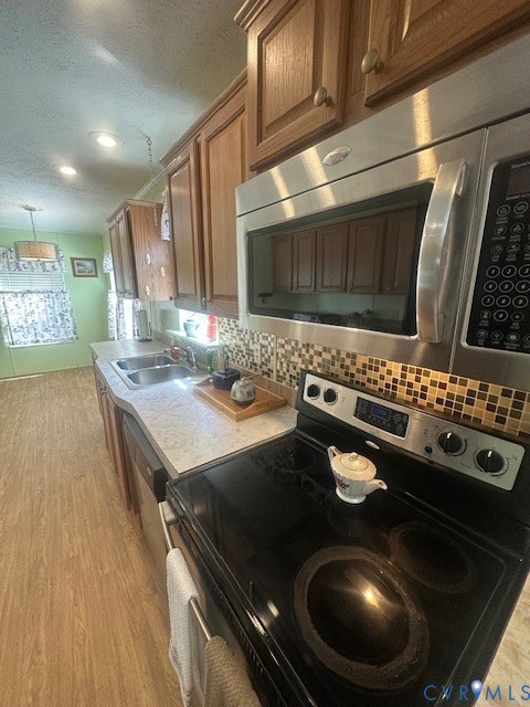 16738 Loco School Road Yale, VA 23897 - Photo 15 of 33 a kitchen with stainless steel appliances granite countertop a stove a sink and a microwave