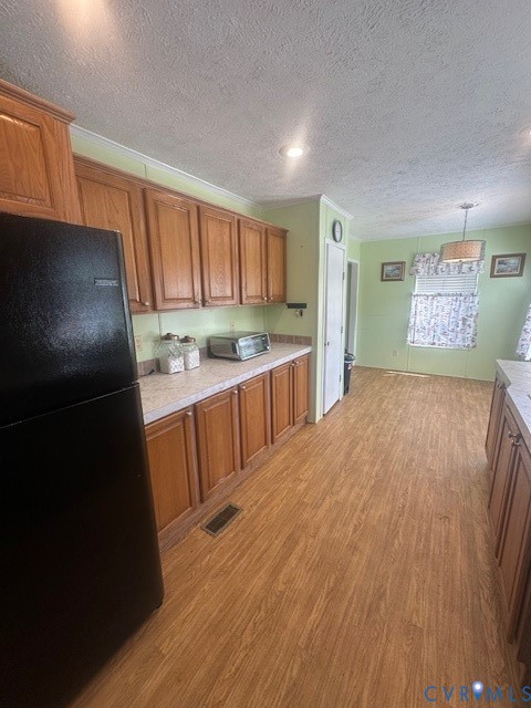 16738 Loco School Road Yale, VA 23897 - Photo 16 of 33 a kitchen with a sink and refrigerator