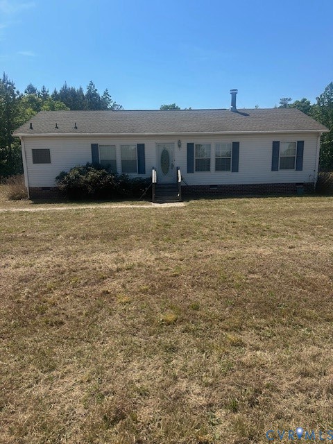 16738 Loco School Road Yale, VA 23897 - Photo 2 of 33 a front view of a house with a yard