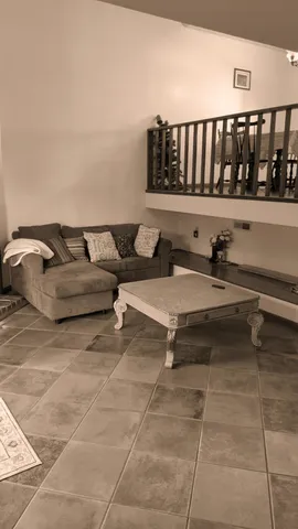 a reading room with a couch