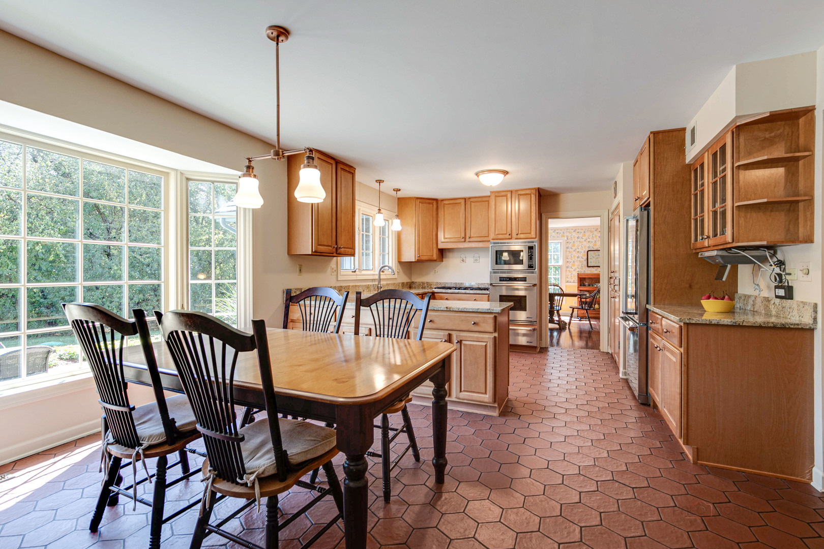 395 Fox Run Road Libertyville, IL 60048 - Photo 15 of 61 a view of a dining room with furniture window and outside view
