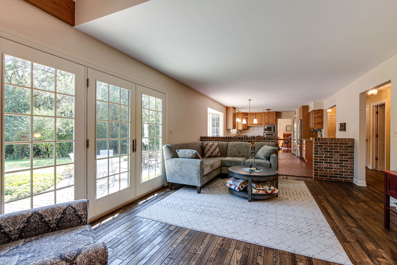 395 Fox Run Road Libertyville, IL 60048 - Photo 17 of 61 a living room with furniture floor to ceiling window and wooden floor