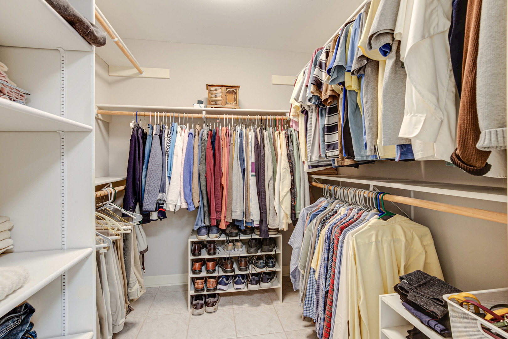 395 Fox Run Road Libertyville, IL 60048 - Photo 37 of 61 a view of walk in closet with clothes and shoes