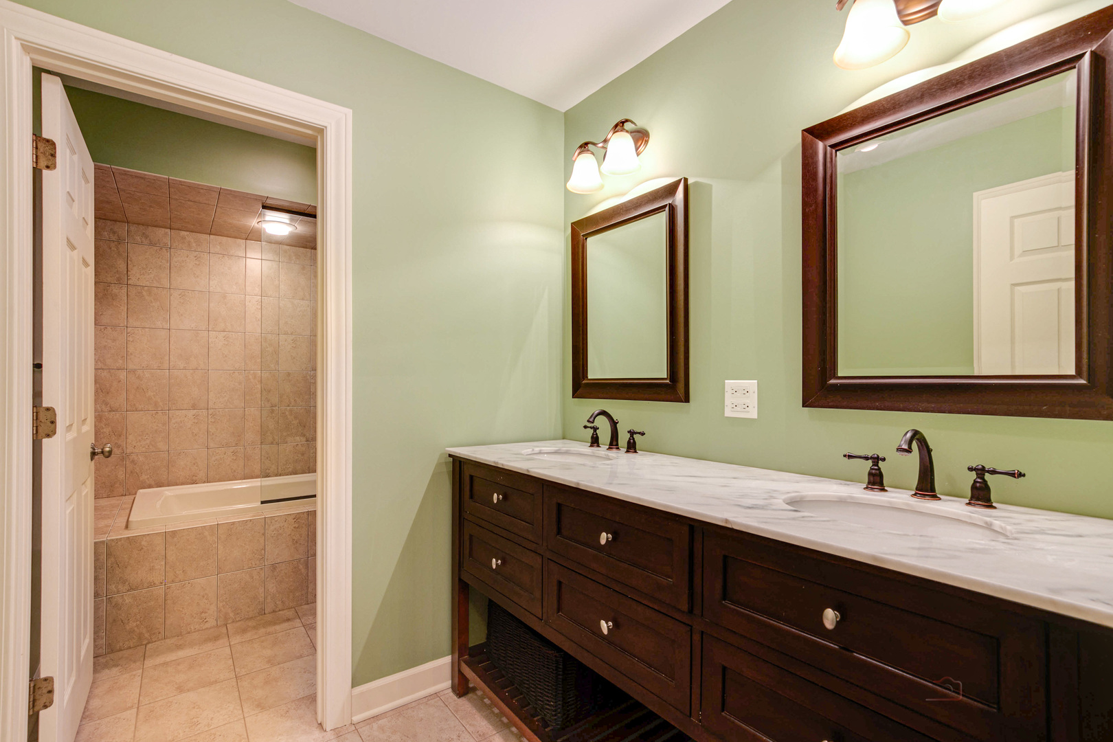 395 Fox Run Road Libertyville, IL 60048 - Photo 41 of 61 a bathroom with a double vanity sink and a mirror
