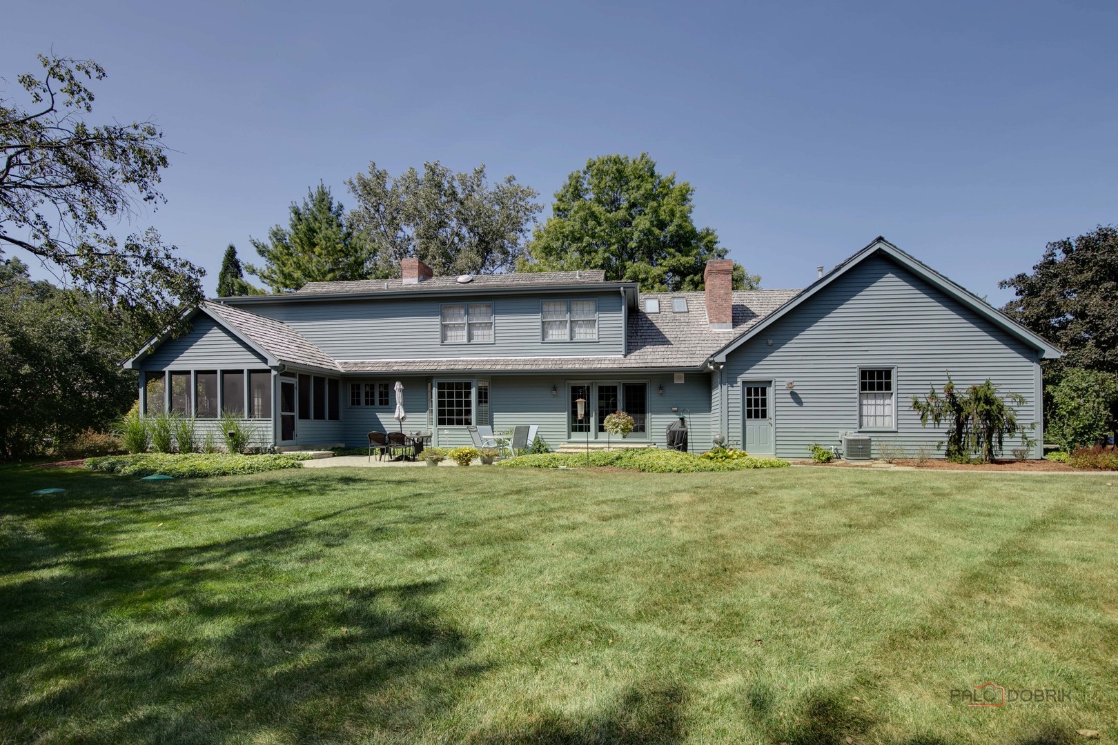 395 Fox Run Road Libertyville, IL 60048 - Photo 51 of 61 a big house with a big yard and large trees