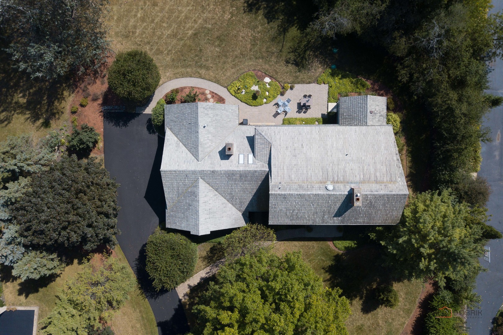 395 Fox Run Road Libertyville, IL 60048 - Photo 60 of 61 an aerial view of a house with a yard and lake view