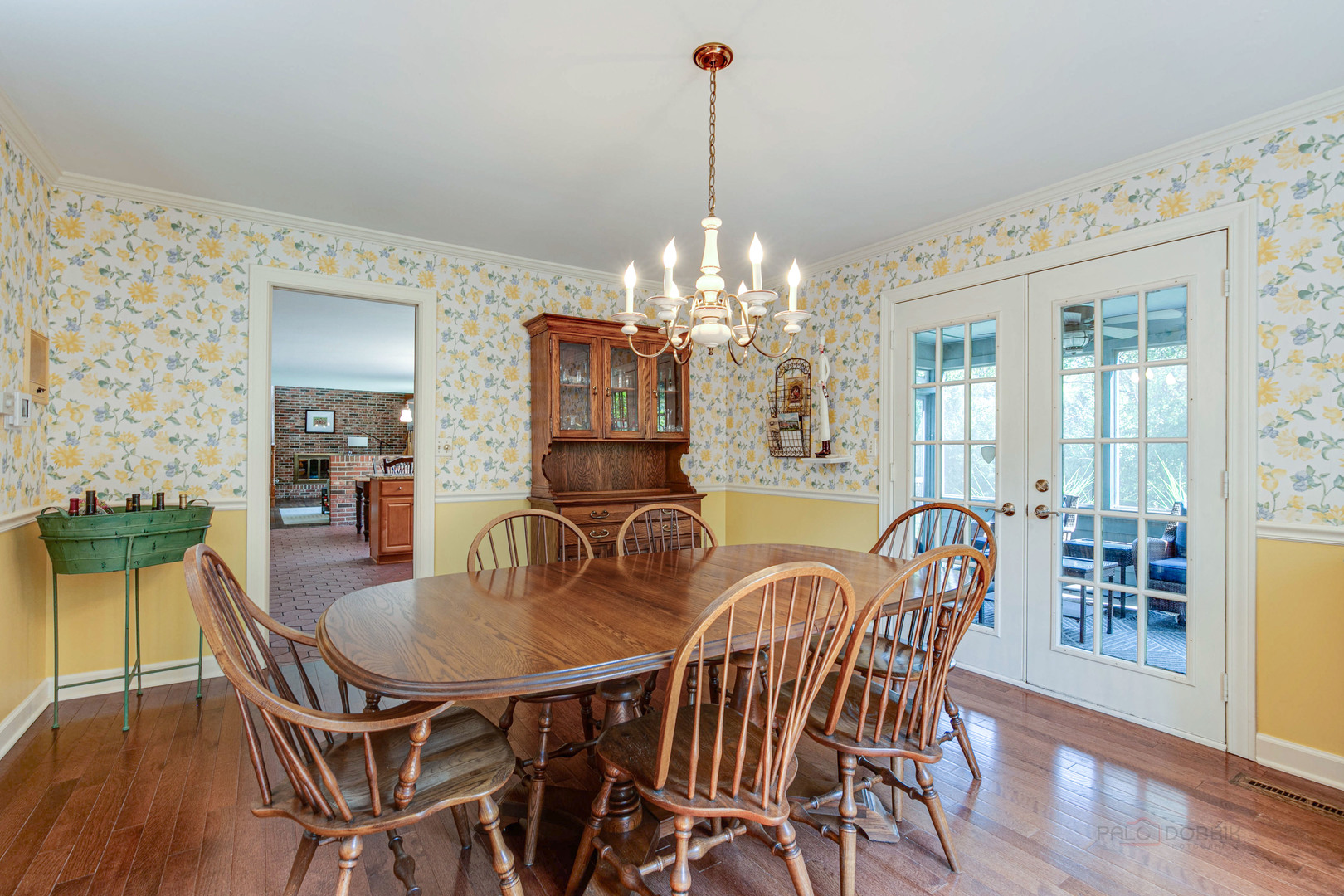 395 Fox Run Road Libertyville, IL 60048 - Photo 8 of 61 a view of a dining room with furniture wooden floor and chandelier