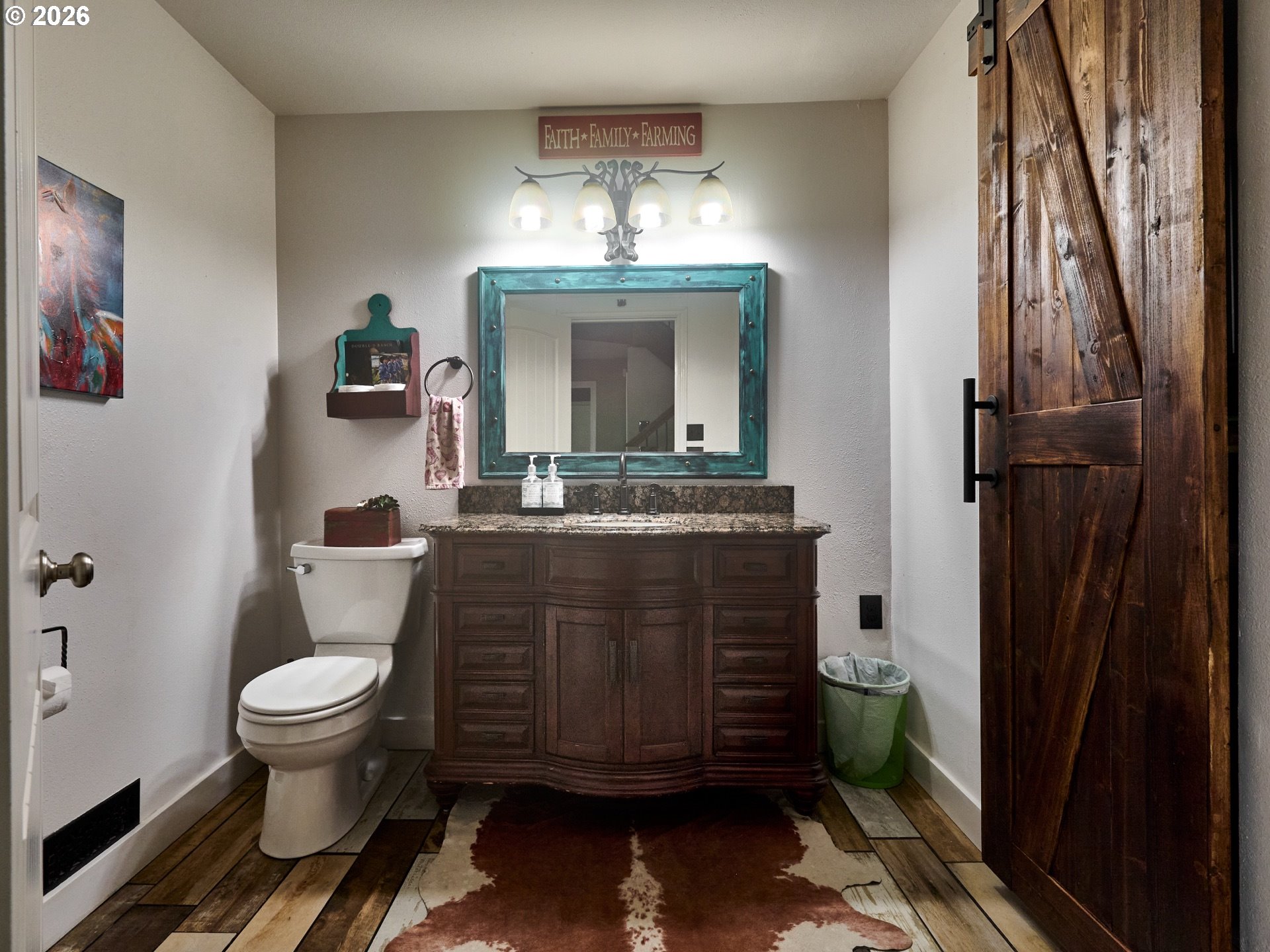 9293 Broadacres Road Northeast Aurora, OR 97002 - Photo 24 of 48 a bathroom with a sink toilet and shower