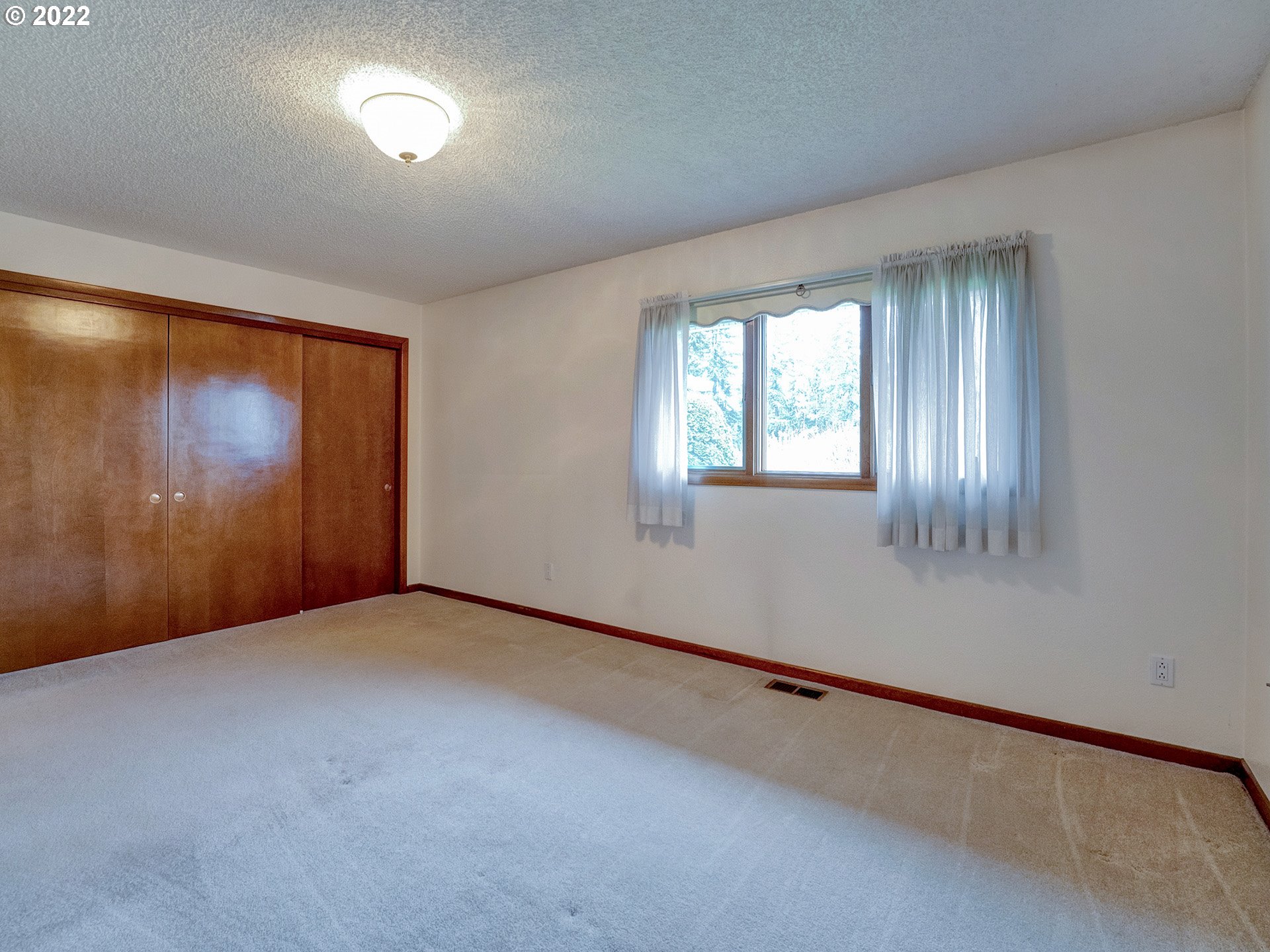 27651 Southeast Kelso Road Boring, OR 97009 - Photo 23 of 32 an empty room with windows