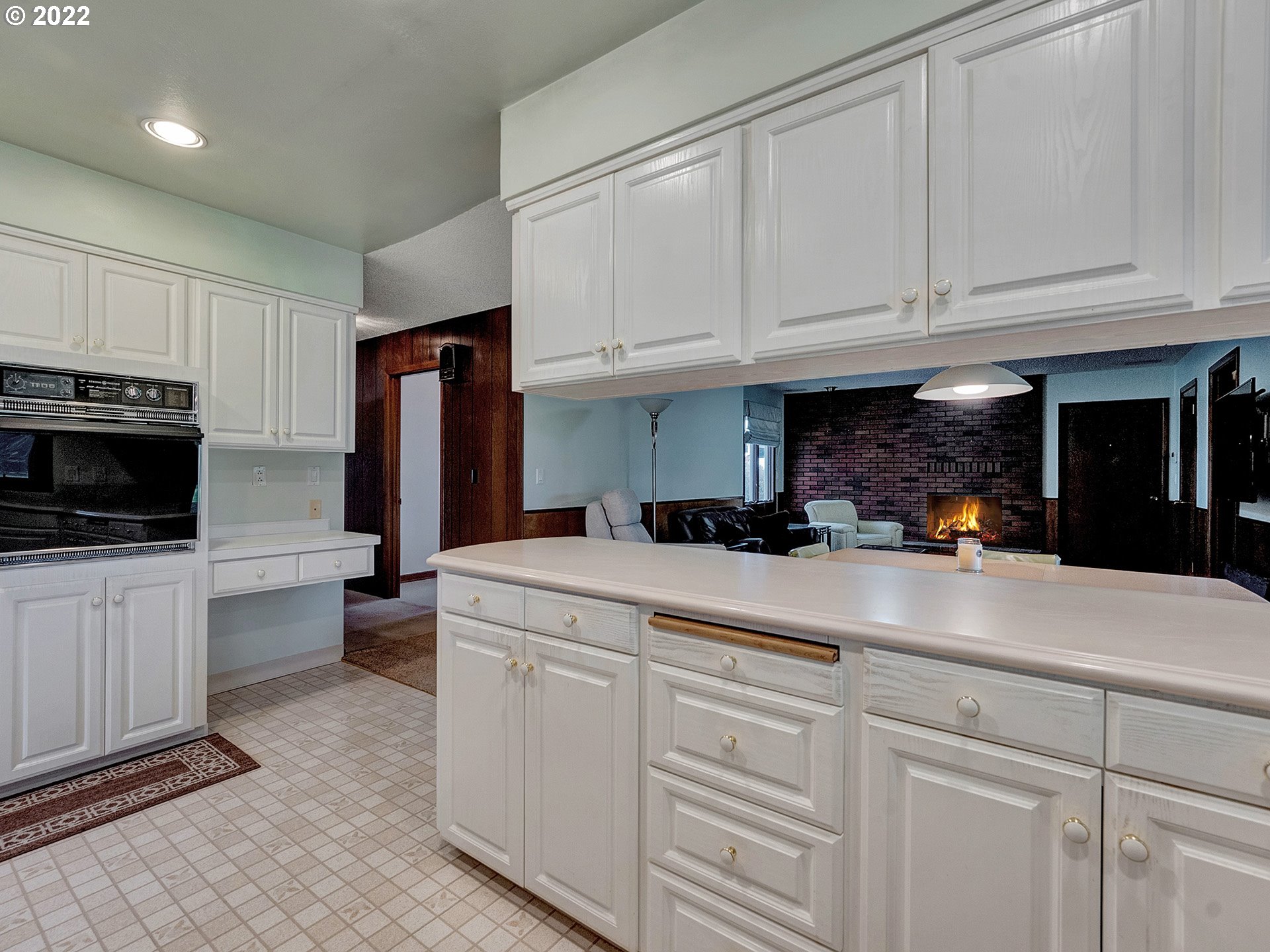 27651 Southeast Kelso Road Boring, OR 97009 - Photo 6 of 32 a kitchen with cabinets appliances a sink and a counter top space
