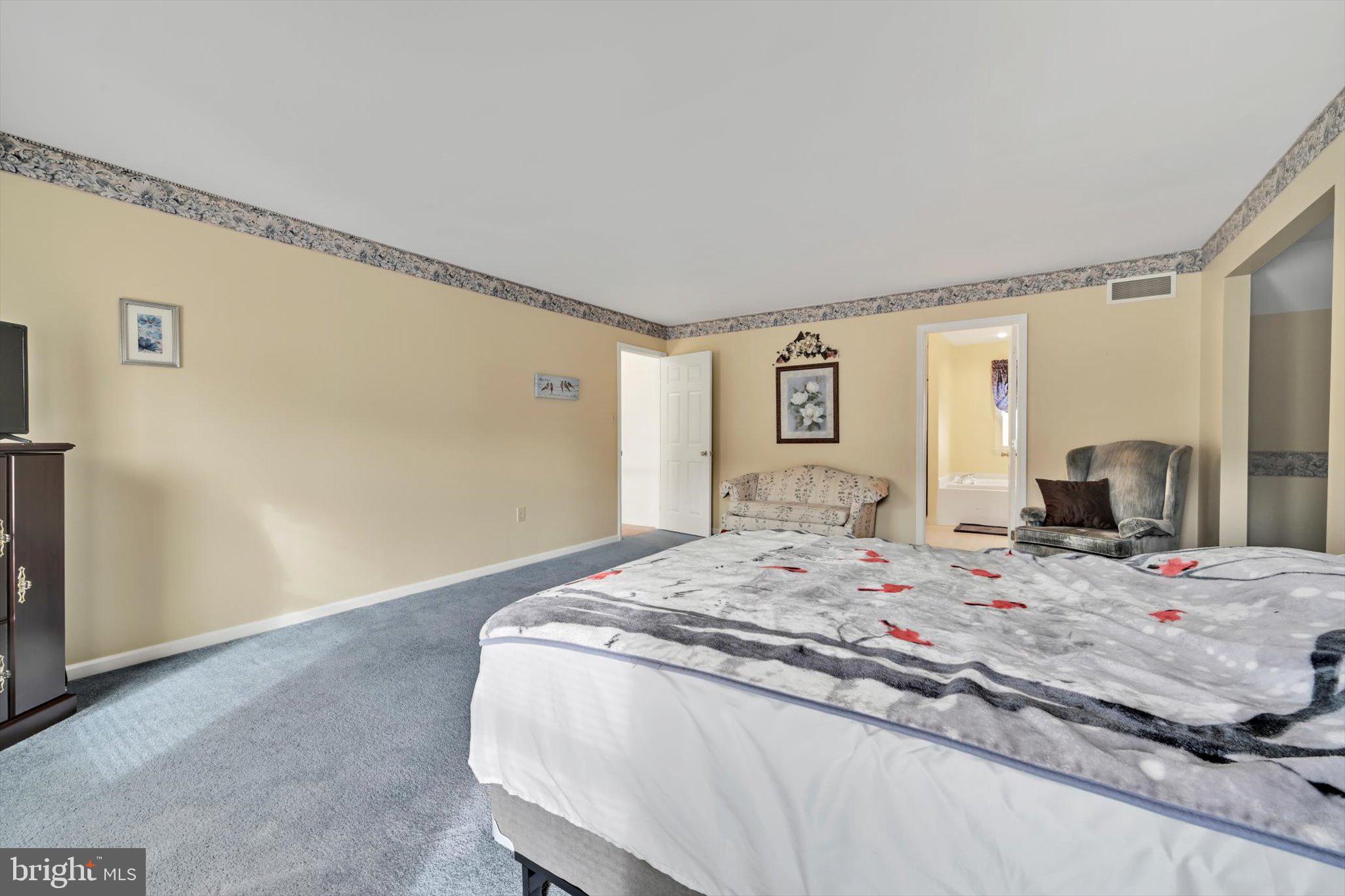 2701 Huyett Drive Sinking Spring, PA 19608 - Photo 21 of 35 a bed sitting in a bedroom and a dresser