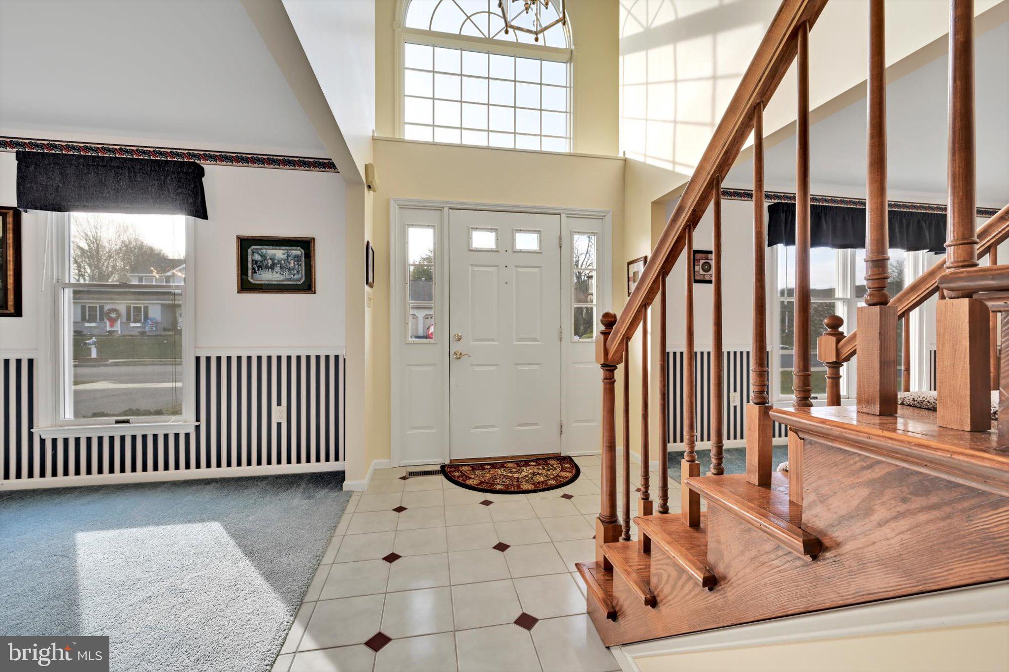 2701 Huyett Drive Sinking Spring, PA 19608 - Photo 4 of 35 a view of a hallway with wooden floor and staircase