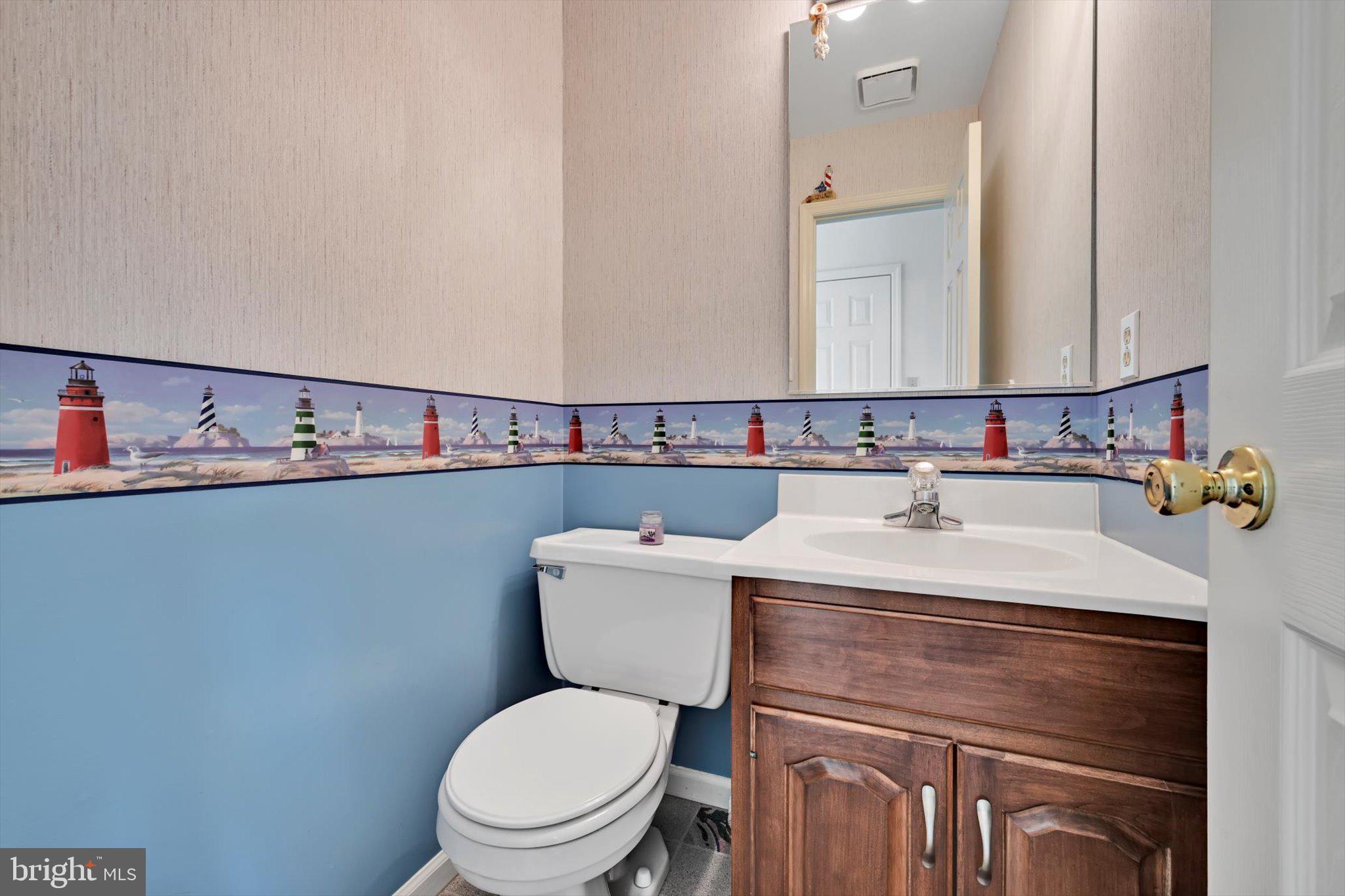 2701 Huyett Drive Sinking Spring, PA 19608 - Photo 10 of 35 a bathroom with a sink toilet and mirror