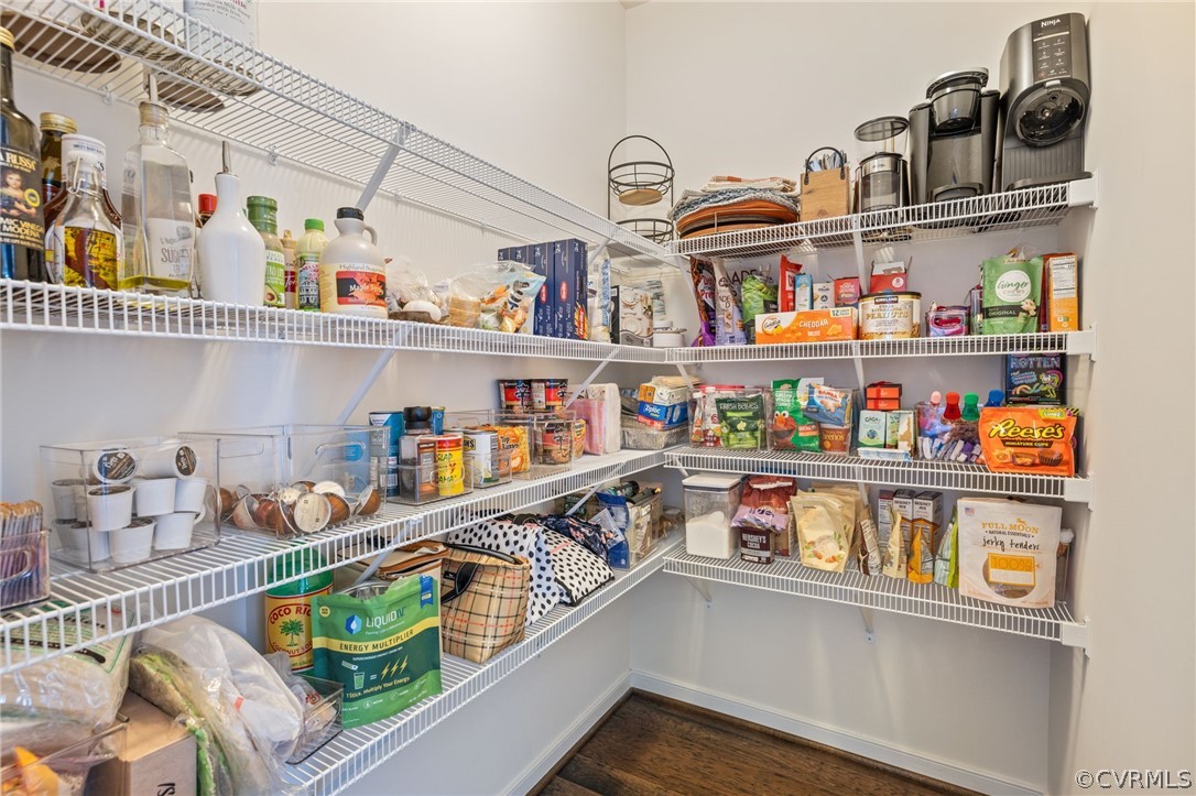 10946 Pointer Holly Path Glen Allen, VA 23059 - Photo 20 of 48 a kitchen with lots of clutter and cabinets