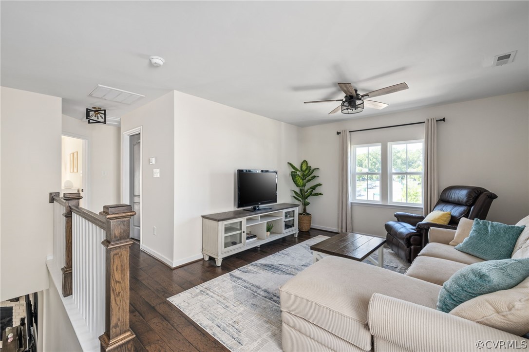 10946 Pointer Holly Path Glen Allen, VA 23059 - Photo 23 of 48 a living room with furniture and a flat screen tv