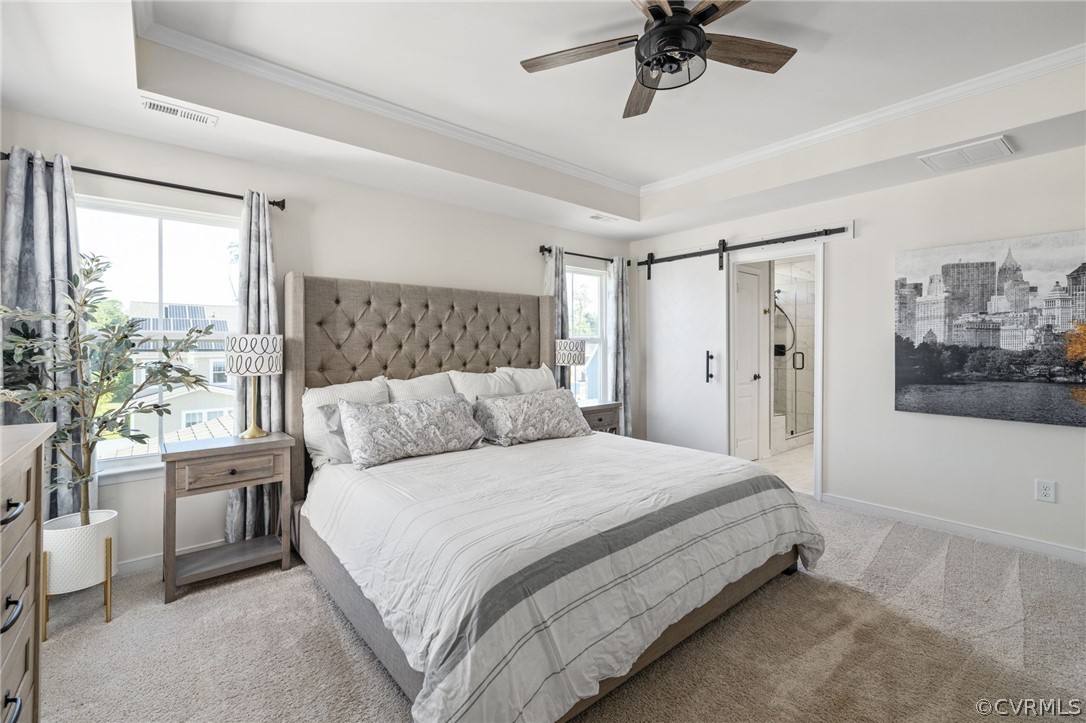 10946 Pointer Holly Path Glen Allen, VA 23059 - Photo 25 of 48 a bedroom with a large bed and a window