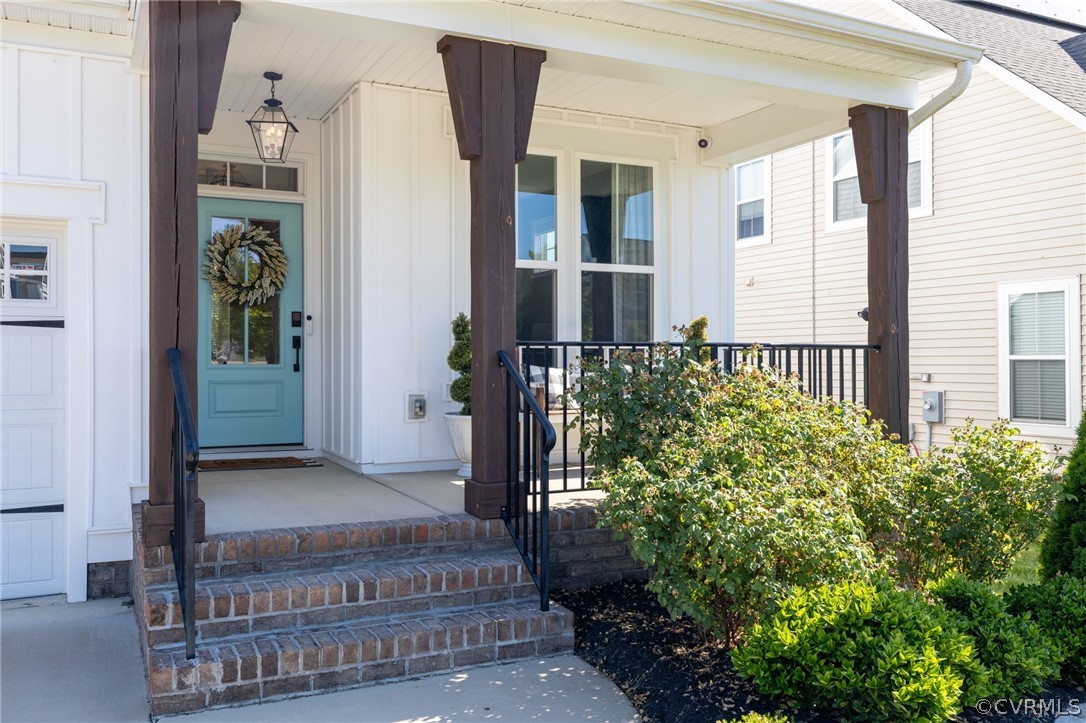 10946 Pointer Holly Path Glen Allen, VA 23059 - Photo 3 of 48 front view of a house with a yard