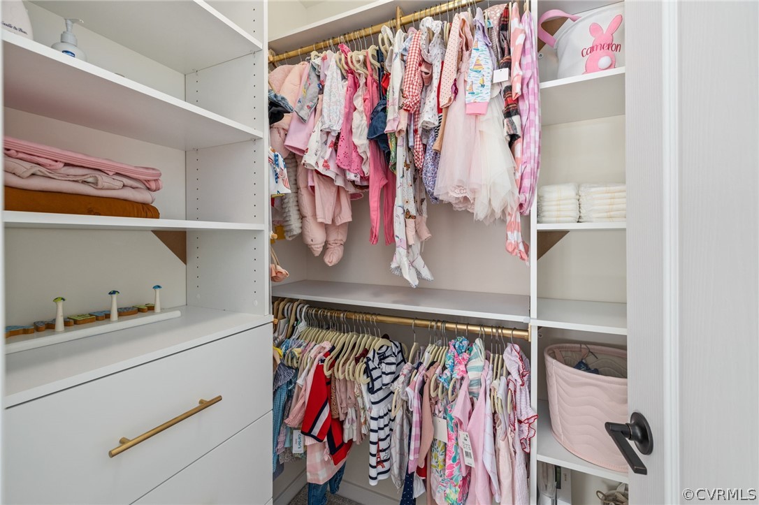 10946 Pointer Holly Path Glen Allen, VA 23059 - Photo 31 of 48 a view of walk in closet with clothes