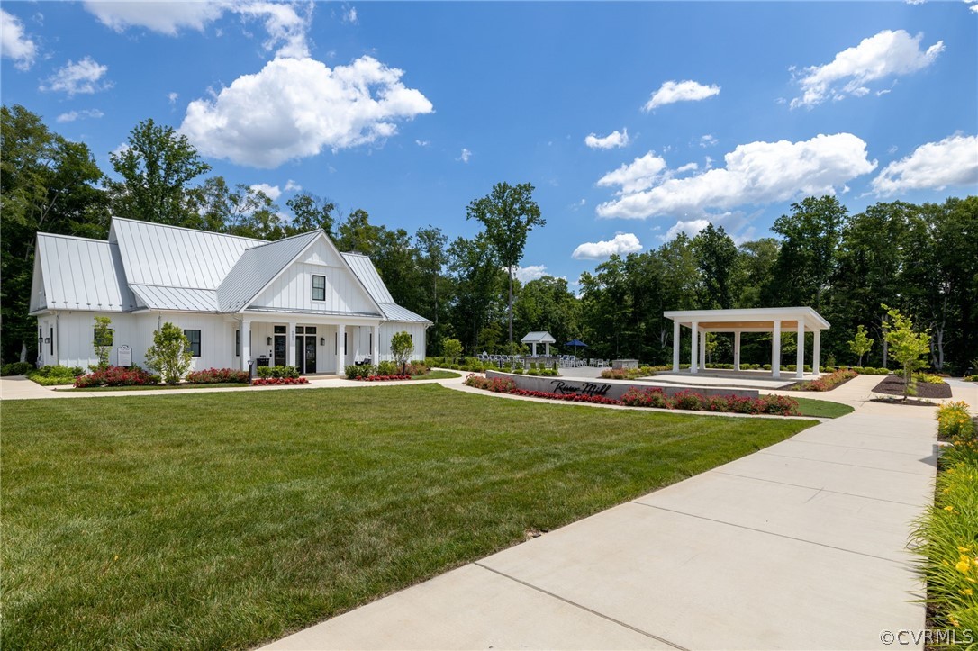 10946 Pointer Holly Path Glen Allen, VA 23059 - Photo 43 of 48 a front view of a house with garden