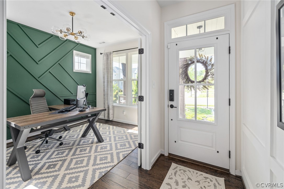 10946 Pointer Holly Path Glen Allen, VA 23059 - Photo 6 of 48 a view of an entryway with wooden floor and a front door