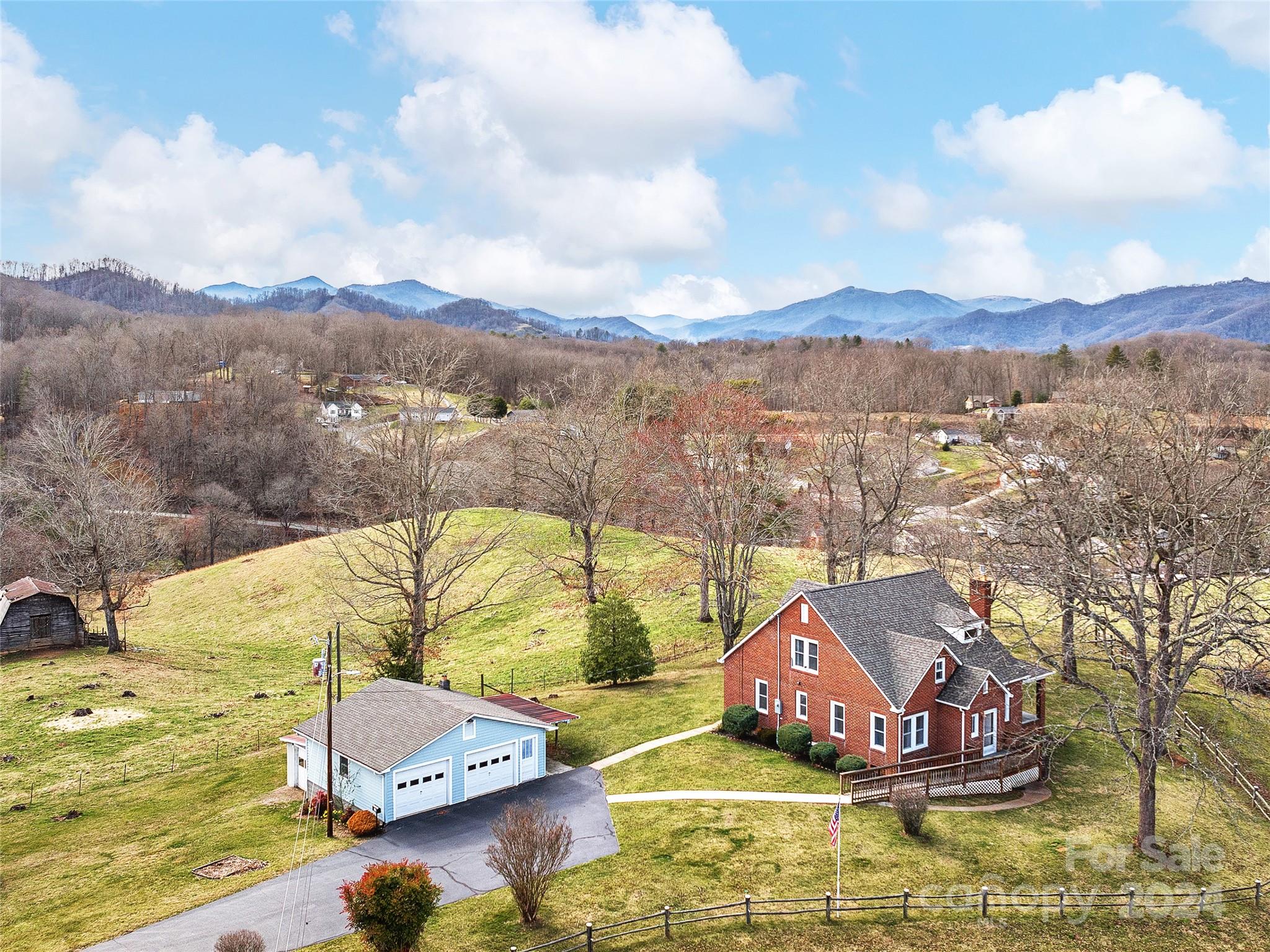 704 Mulberry Street Clyde, NC 28721 - Photo 2 of 36 a view of an ocean from a balcony