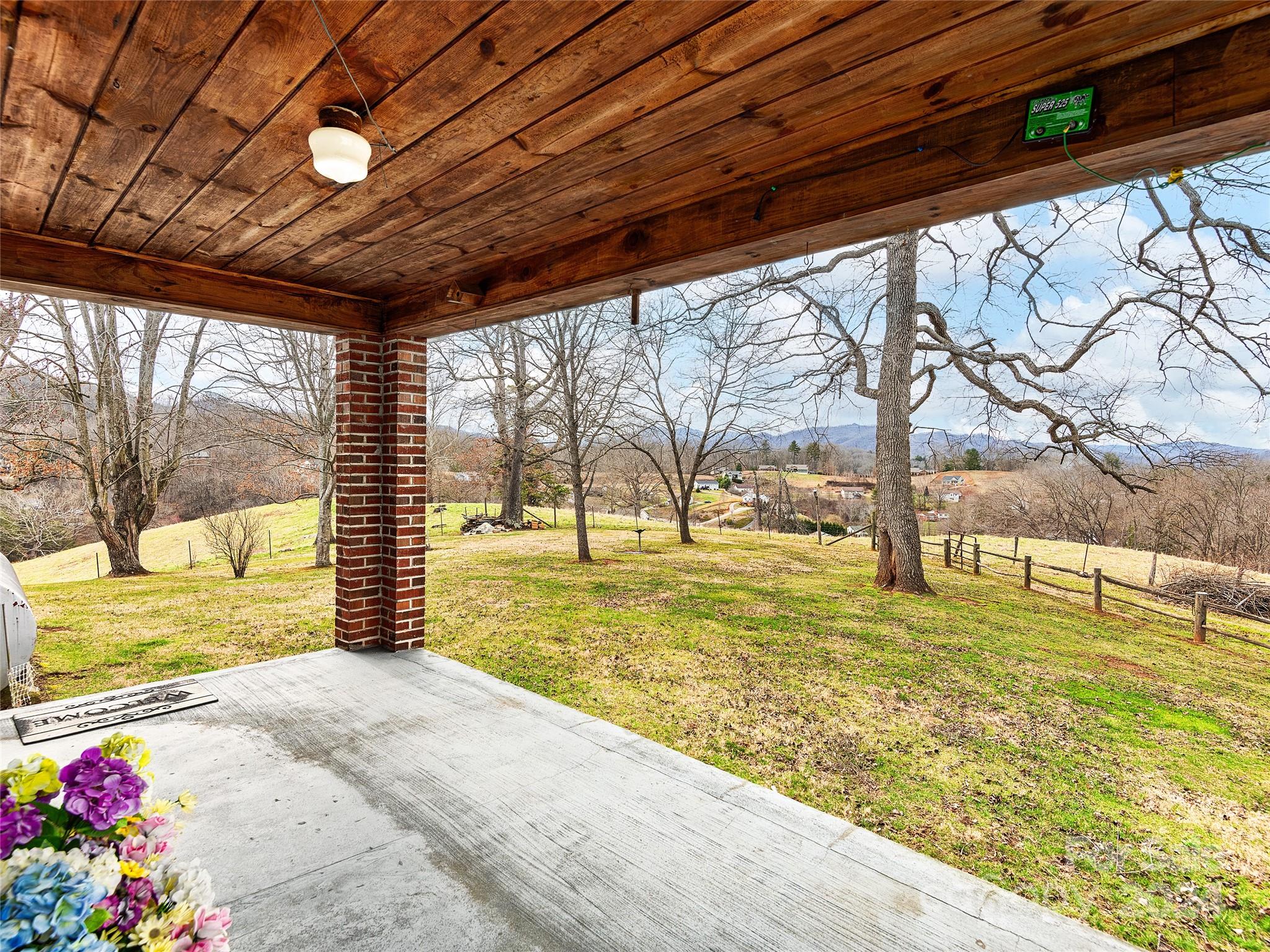 704 Mulberry Street Clyde, NC 28721 - Photo 22 of 36 a swimming pool with an outdoor seating