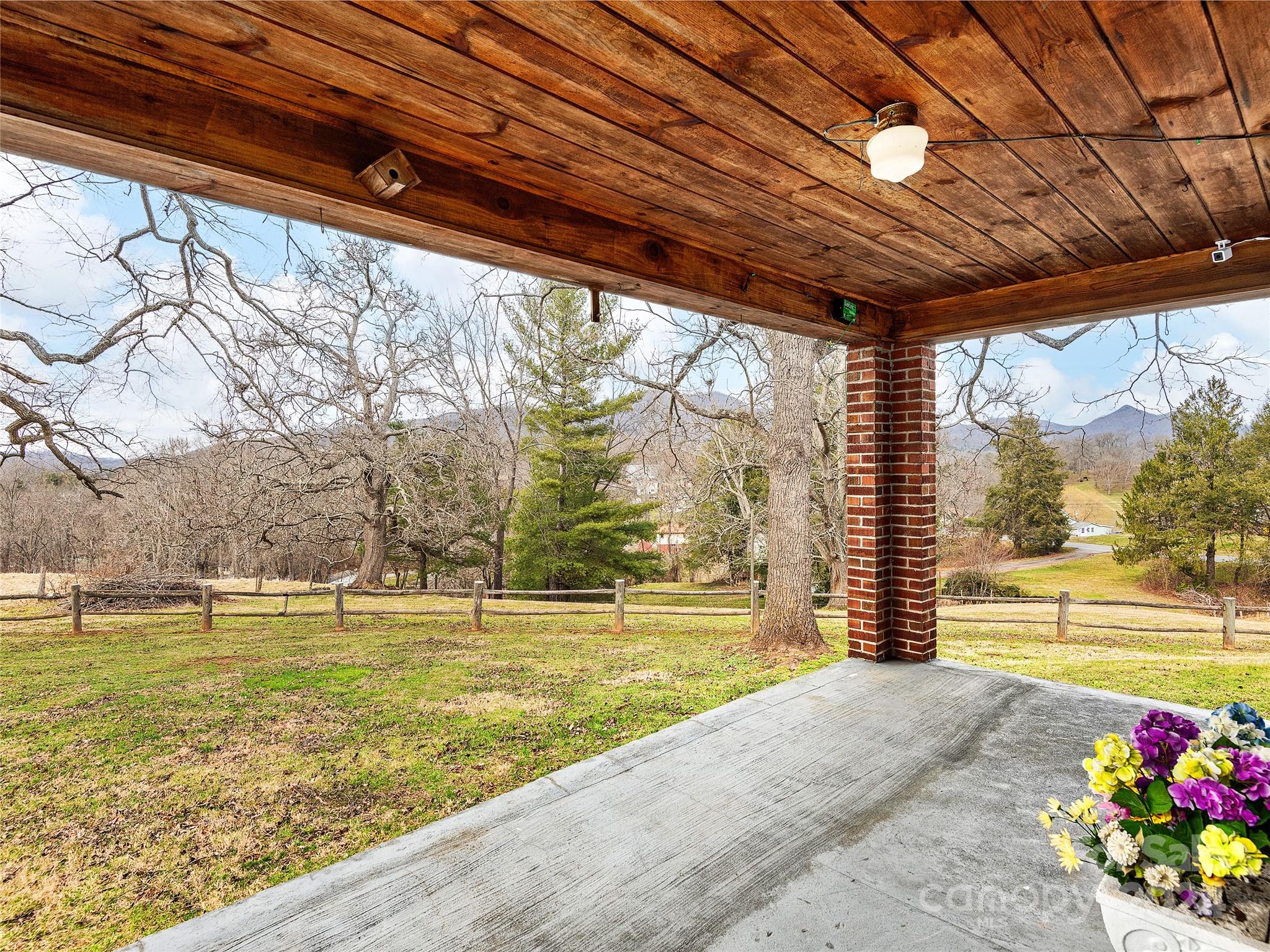 704 Mulberry Street Clyde, NC 28721 - Photo 23 of 36 a view of an ocean with a swimming pool