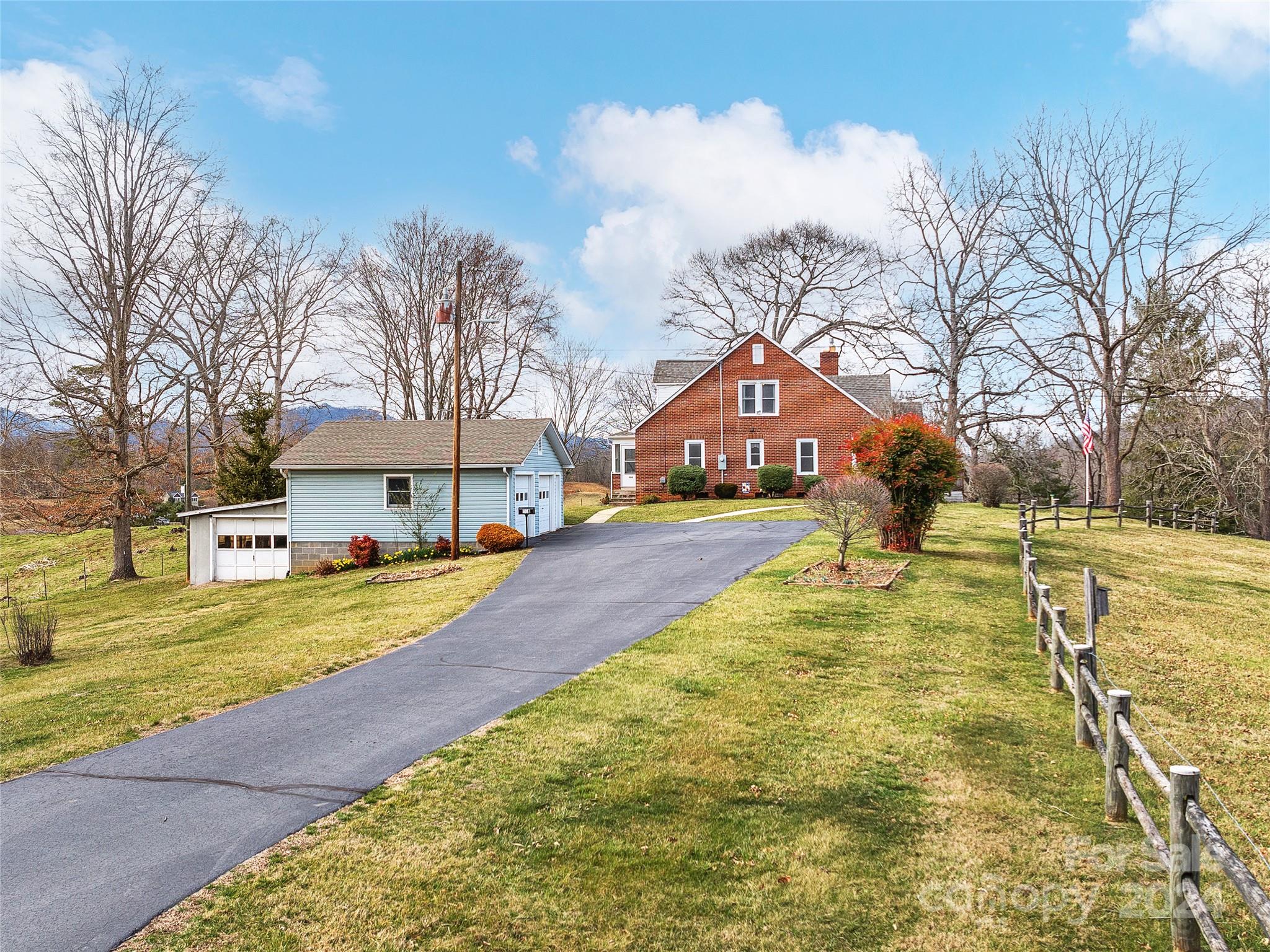 704 Mulberry Street Clyde, NC 28721 - Photo 31 of 36 a house with swimming pool in front of it