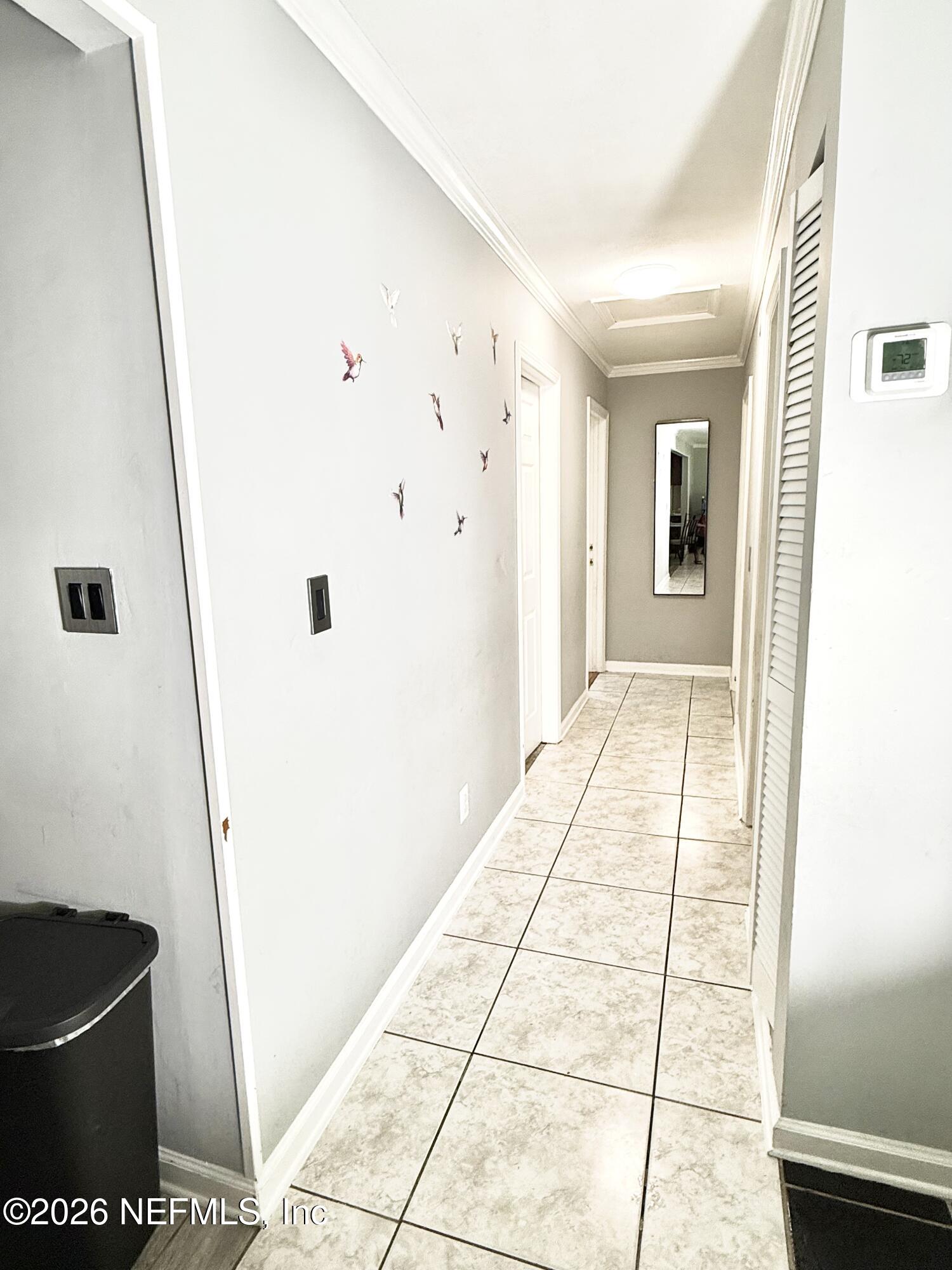 10162 Herndon Road Jacksonville, FL 32246 - Photo 7 of 31 a view of a hallway