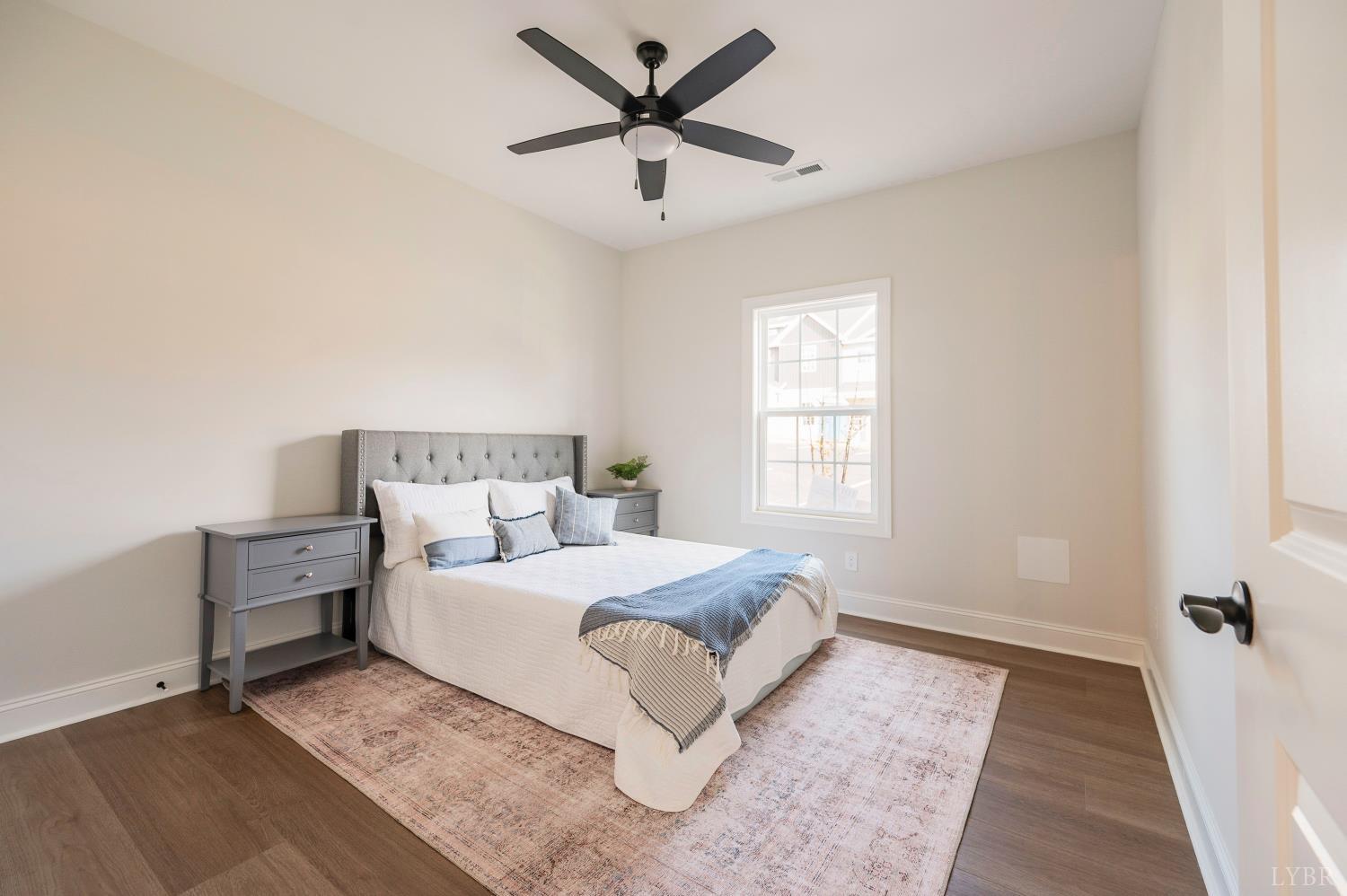 536 Leesville Road, Unit 303 Lynchburg, VA 24502 - Photo 11 of 34 a bedroom with a bed and window