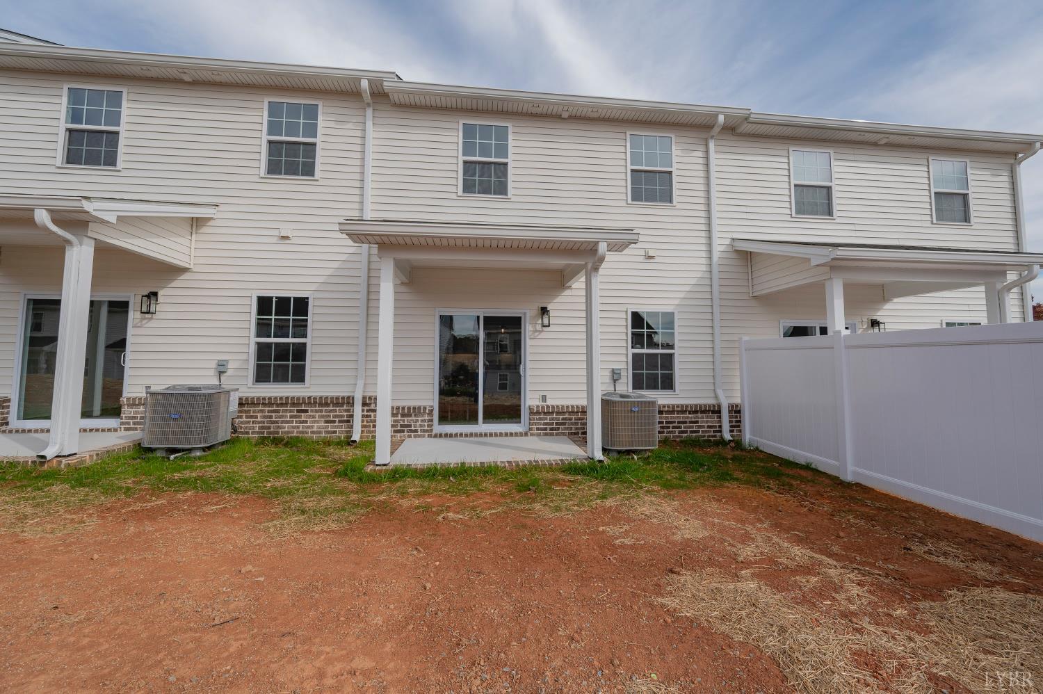 536 Leesville Road, Unit 303 Lynchburg, VA 24502 - Photo 29 of 34 front view of a house with a yard