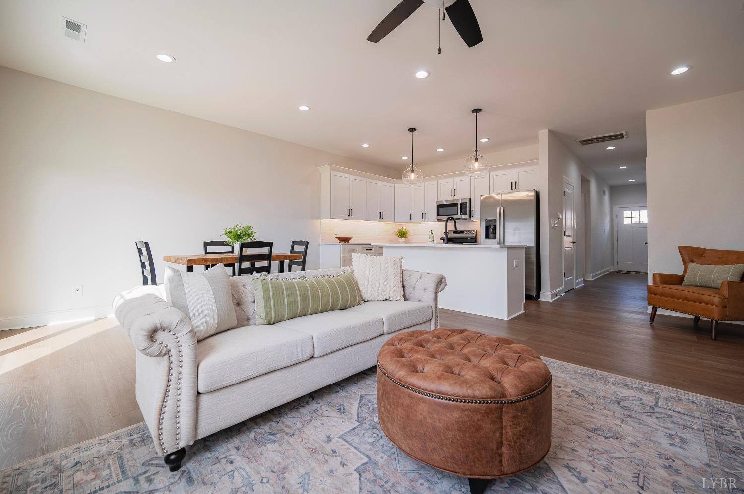 536 Leesville Road, Unit 303 Lynchburg, VA 24502 - Photo 3 of 34 a living room with furniture and kitchen view