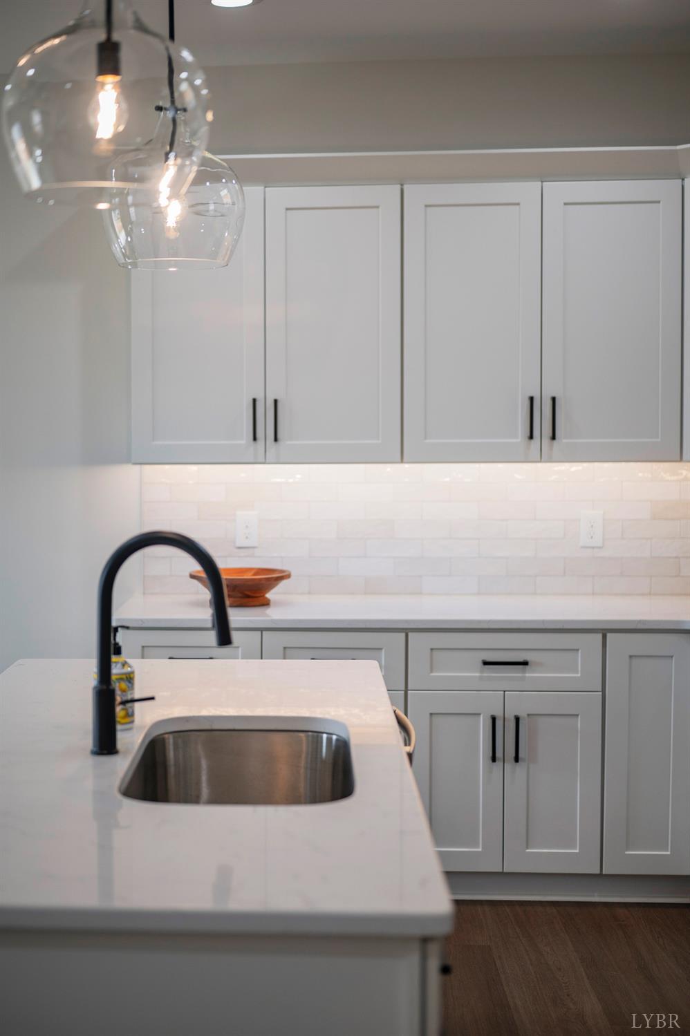 536 Leesville Road, Unit 303 Lynchburg, VA 24502 - Photo 31 of 34 a close view of a sink a faucet and appliance in the kitchen