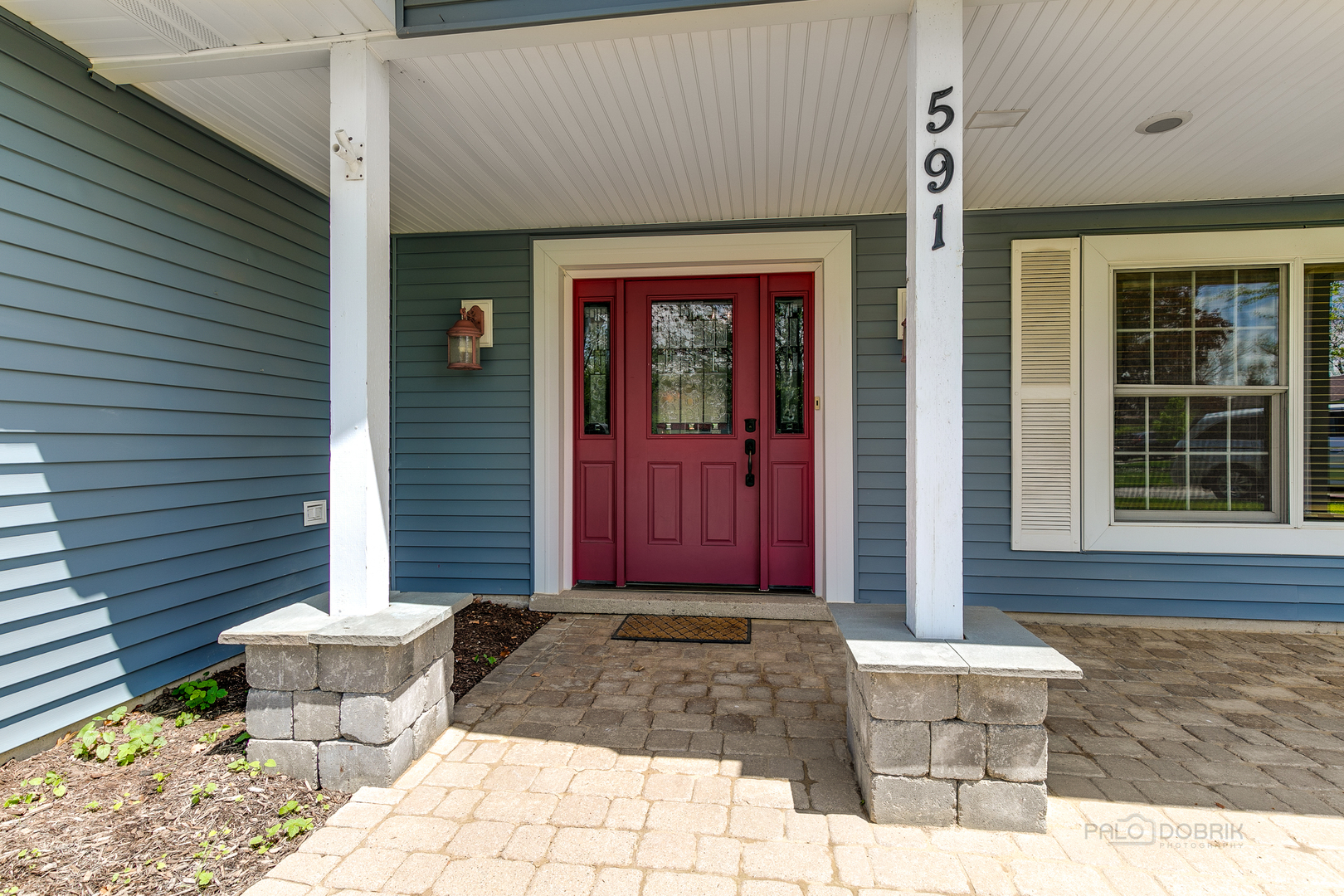 591 Surryse Road Lake Zurich, IL 60047 - Photo 2 of 33 a front view of a house with a yard