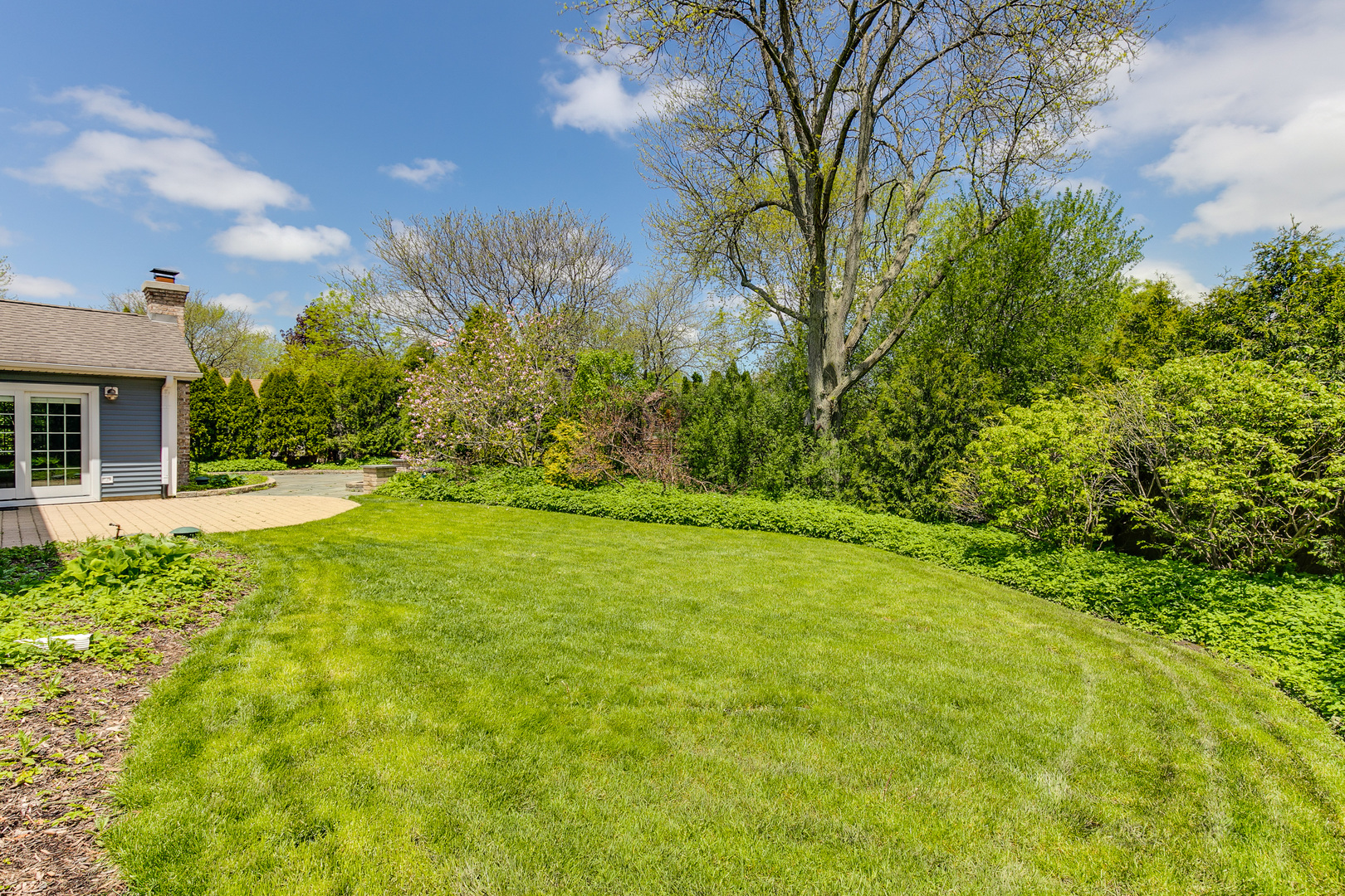 591 Surryse Road Lake Zurich, IL 60047 - Photo 33 of 33 a view of a yard with an tree